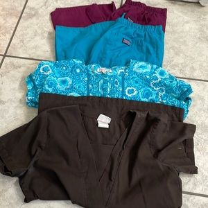 Lot of Cherokee scrub pants and peaches tops